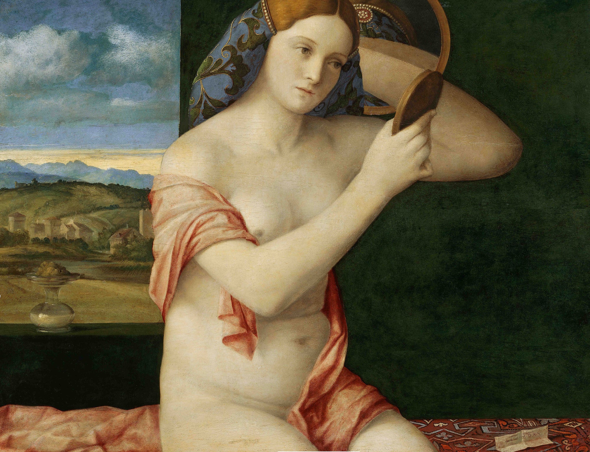 Giovane donna nuda allo specchio